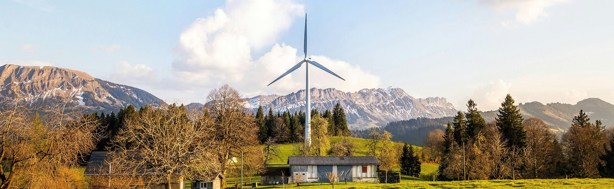 Wind turbine in scenic mountain landscape