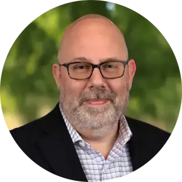 Man in formal attire outdoors