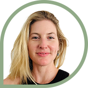 Woman with blonde hair in black top