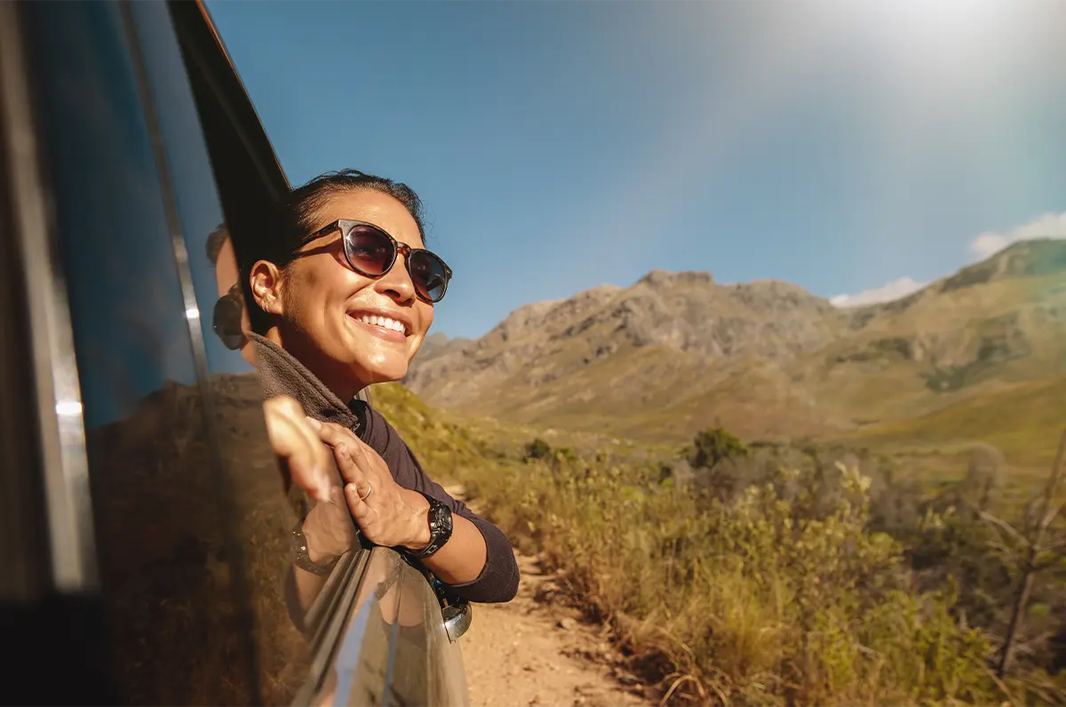 woman in a truck on safari