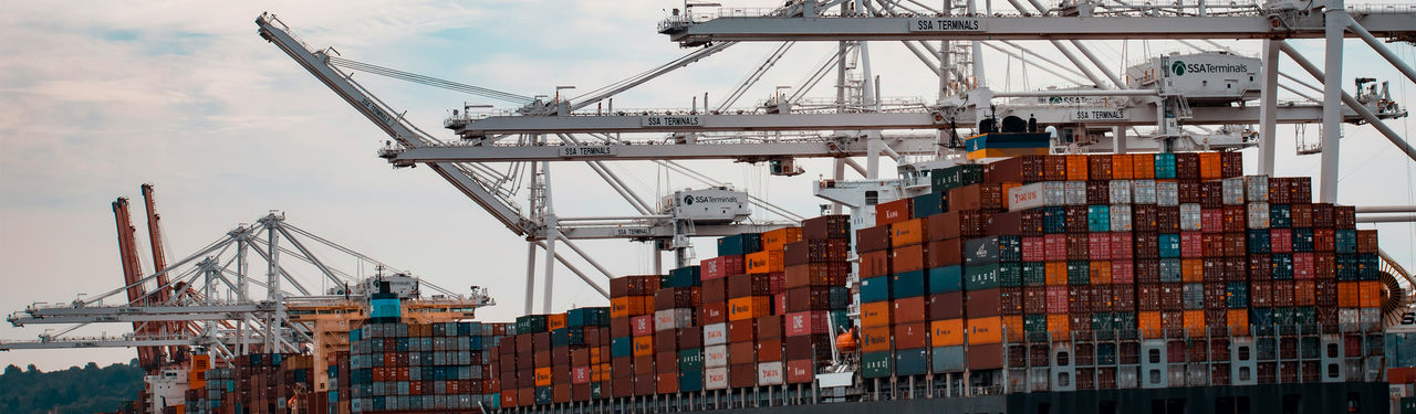 Shipping containers at busy port terminal