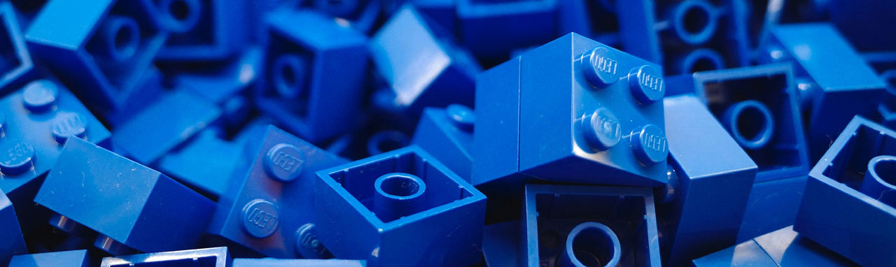 Pile of blue plastic building blocks